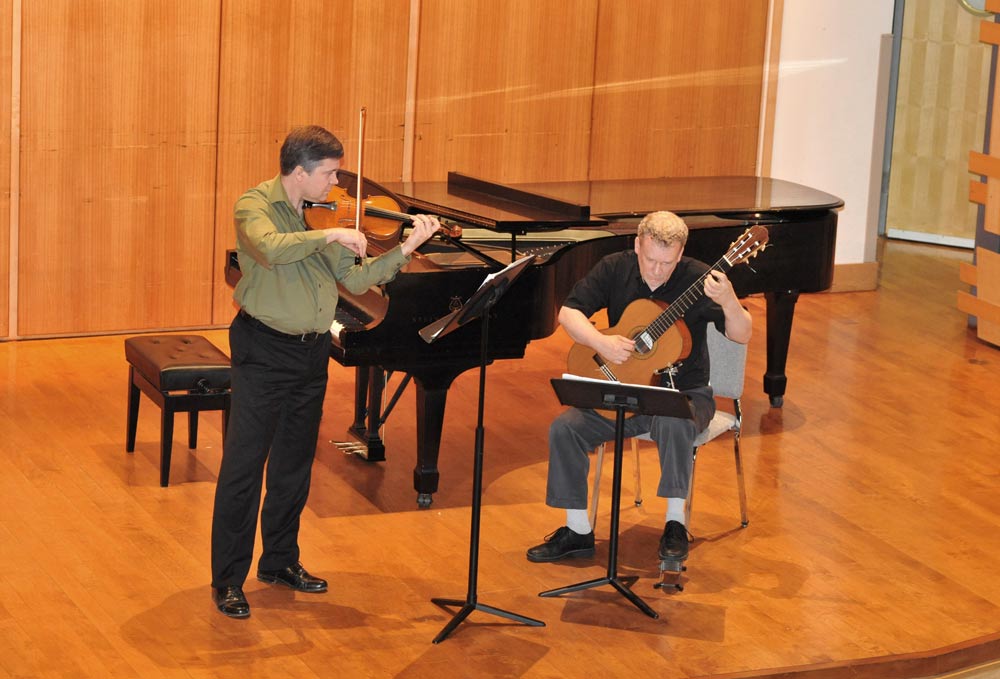 Eric Lawson and Jeff Anvinson onstage at Rock Hall, Philadelphia, performing Mahle's Sonata for Violin and Guitar